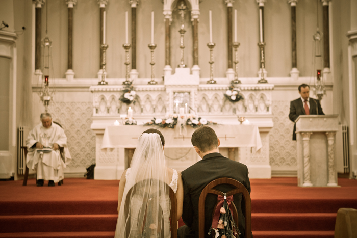 bride and groom at altar wedding ceremony  church